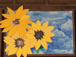 a student's artwork of sunflowers