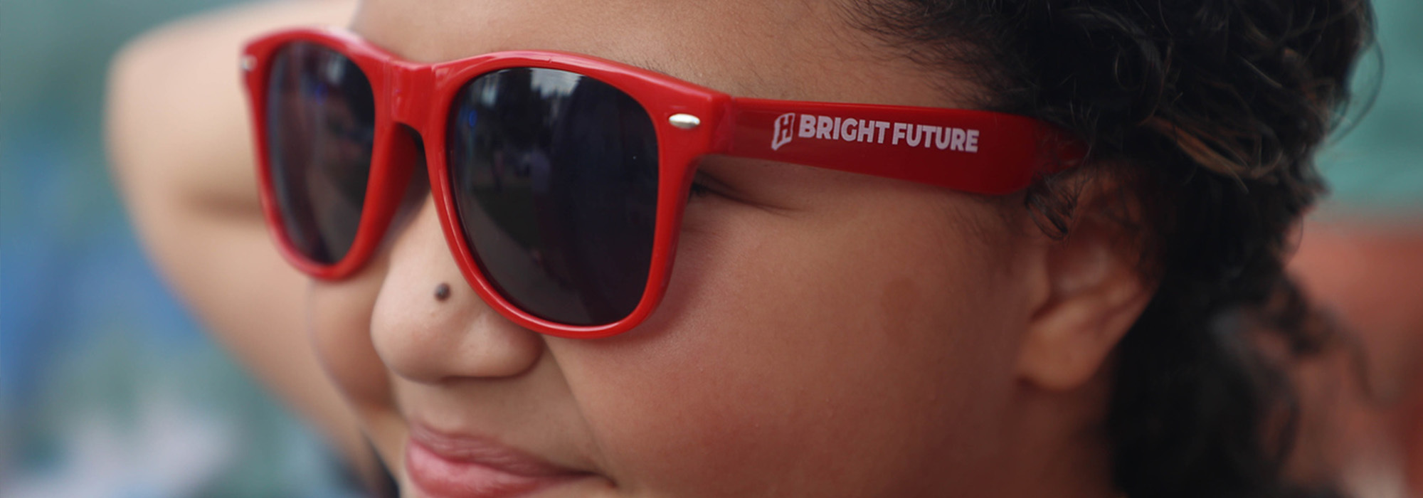 Girl wearing Sunglasses with Bright Future